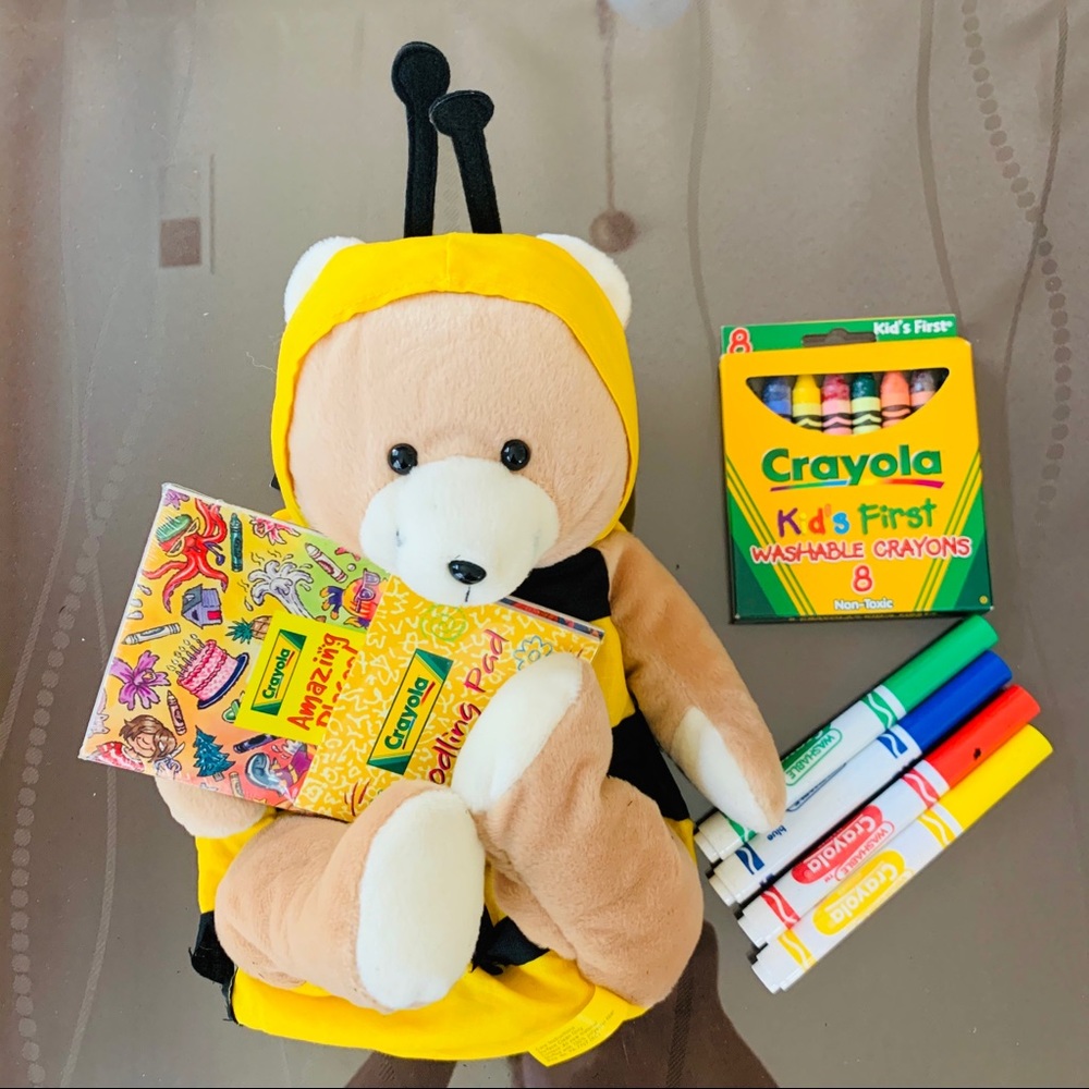 Bumble bee stuffed animal with crayons